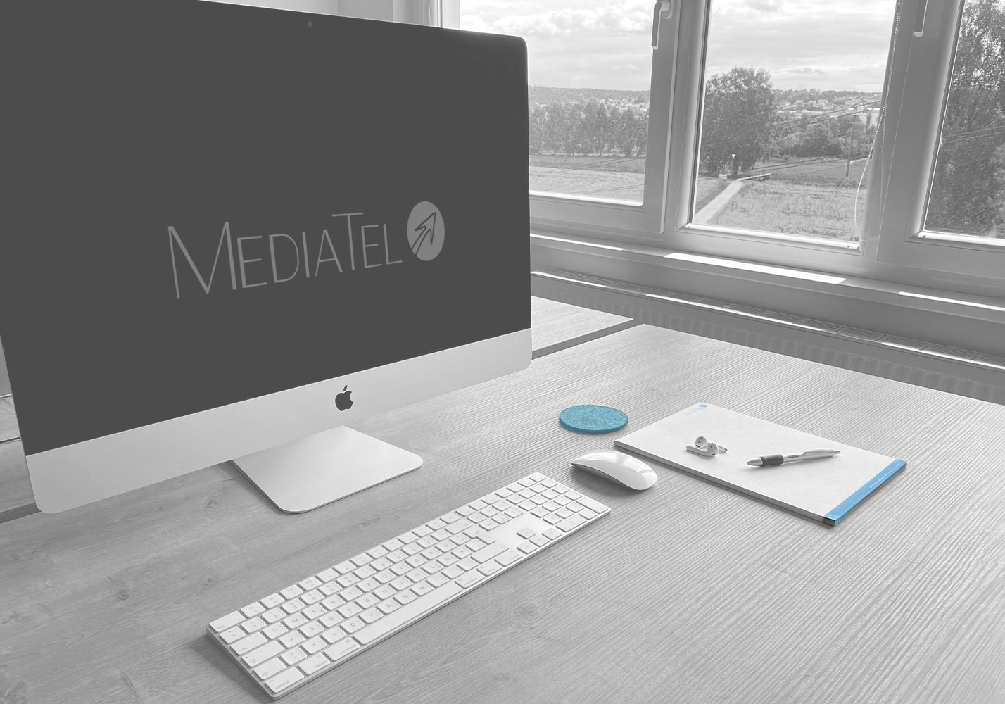 MediaTel-Header-Image_edit-grey_Logo